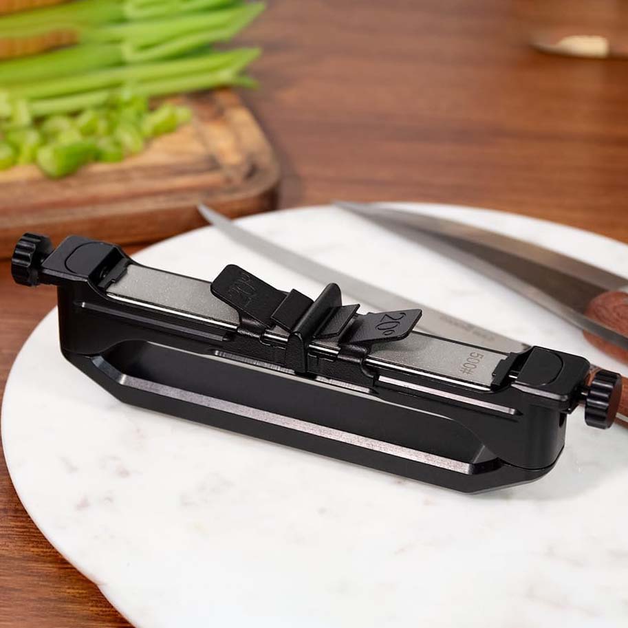 Handheld angle-guided portable knife sharpener