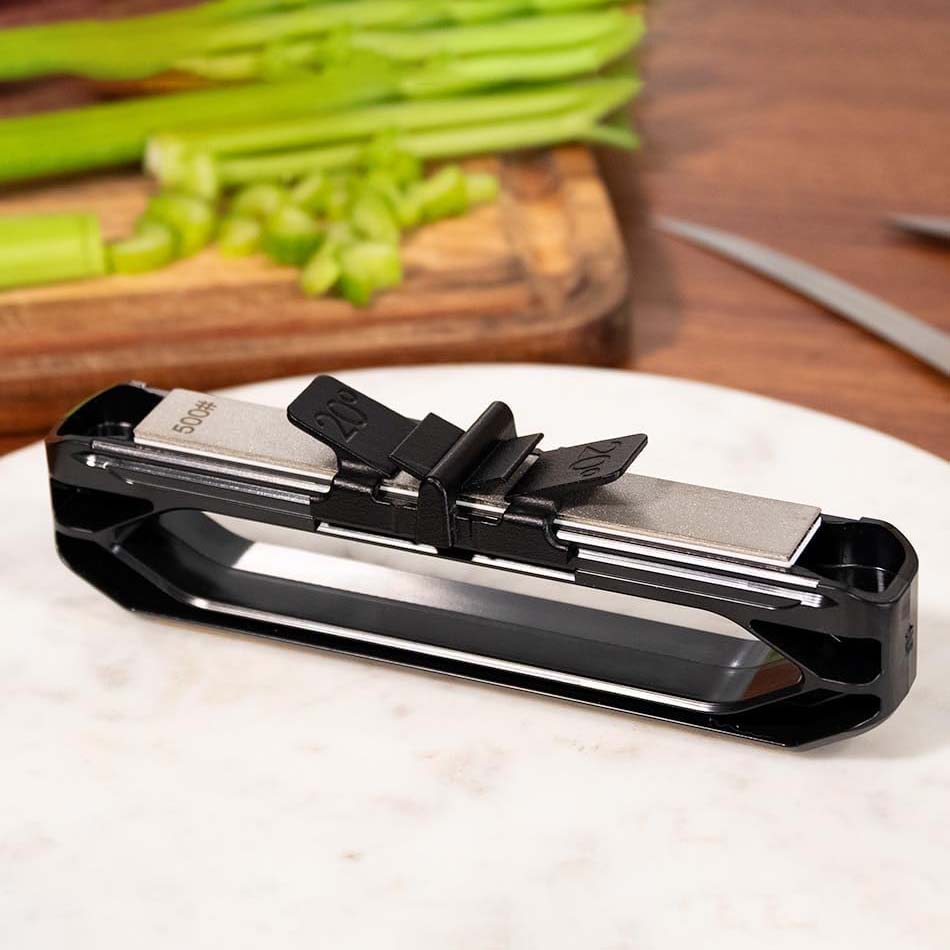 Handheld angle-guided portable knife sharpener