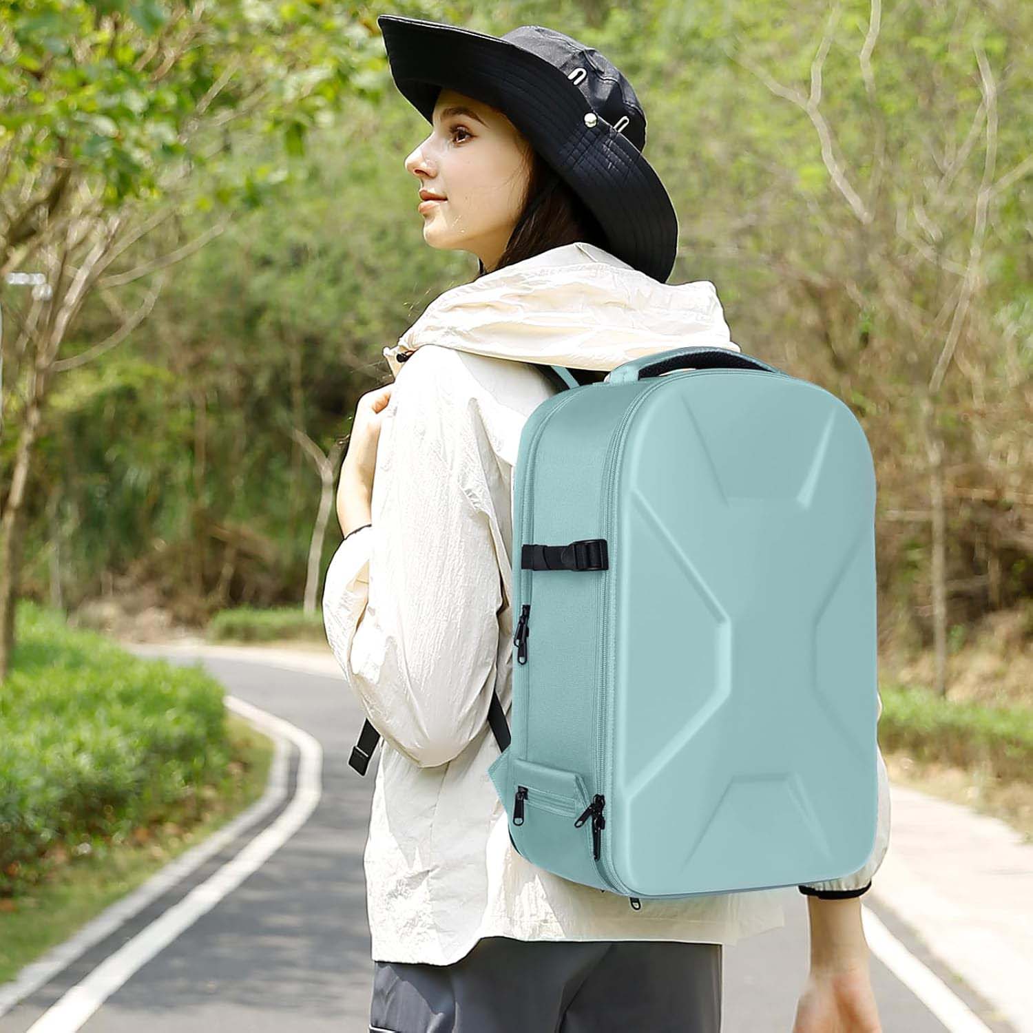 Camera backpack, waterproof hard shell for DSLR/mirrorless cameras, with tripod straps and compartments.