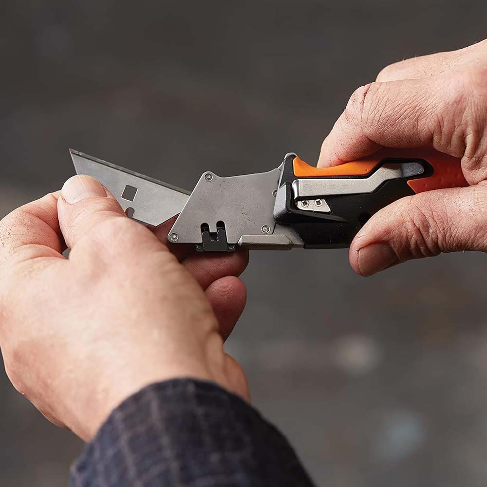Folding multi-purpose knife, 17 cm long, stainless steel blade/plastic handle, black/orange